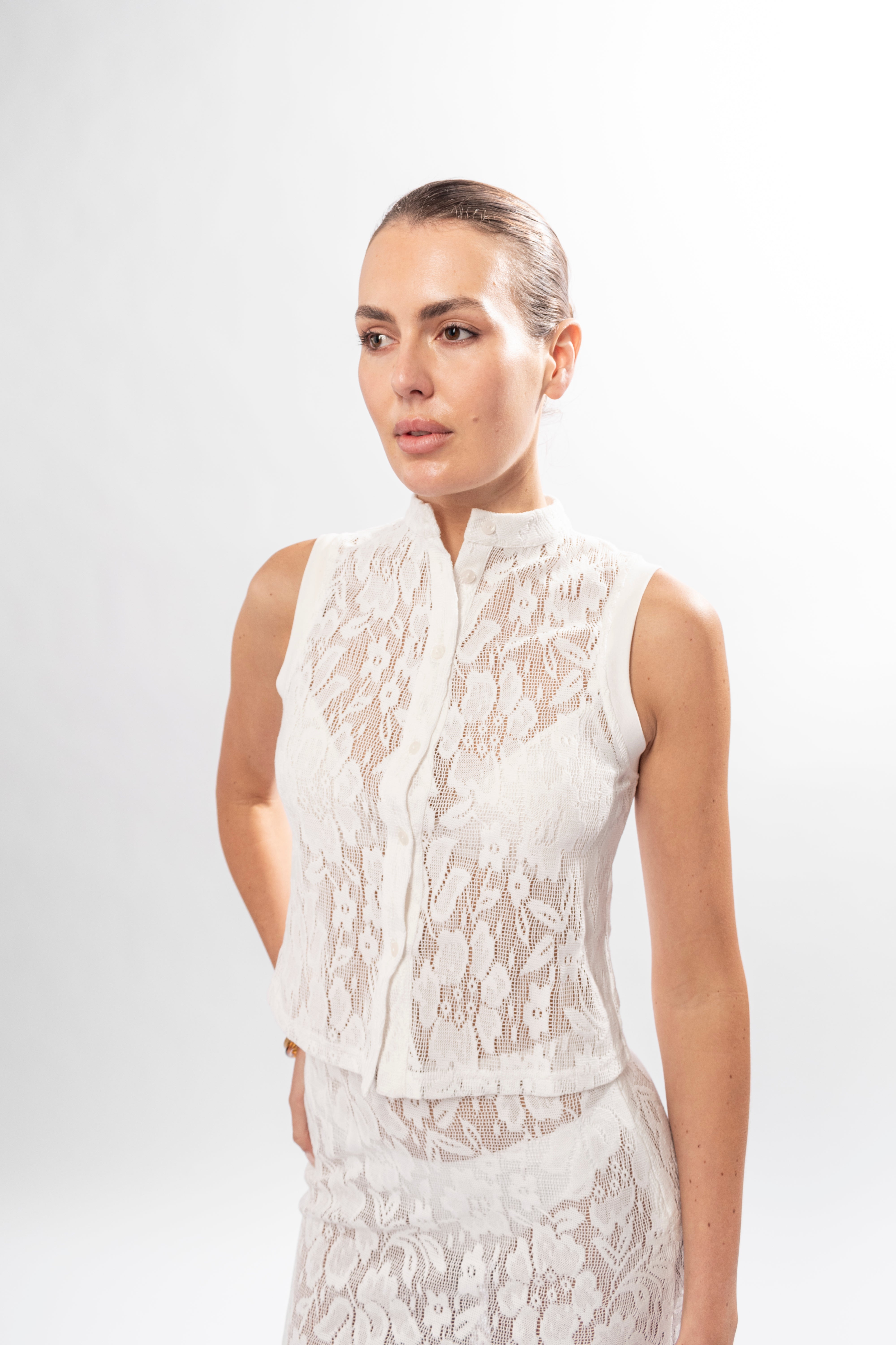 Close-up of lace fabric on Annabelle Lace Top with delicate texture